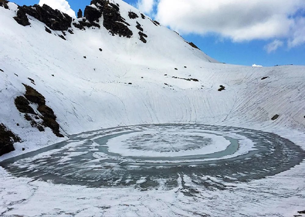 Person looking at snowy mountains