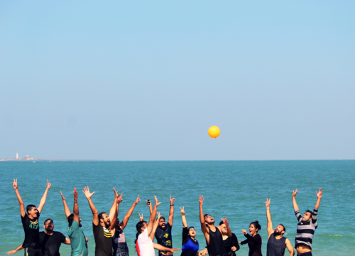 Volleyball Playing near Beach